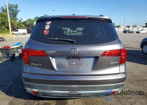 2017 Honda Pilot Touring z USA, uszkodzony, nr VIN 5FNYF5H96HB026875
